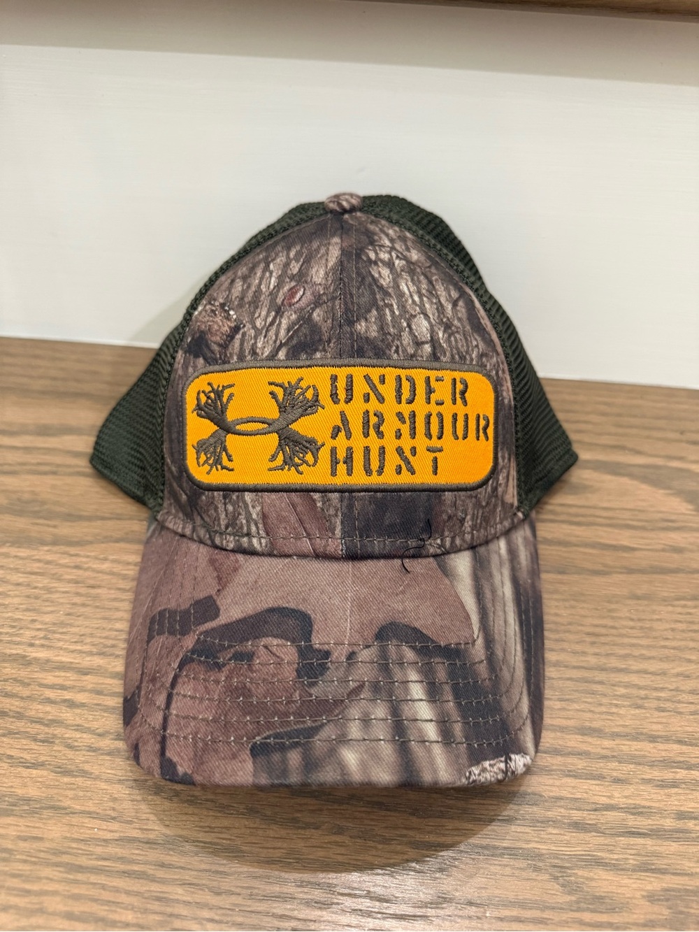 Under Armour Camo Trucker Hat with Orange Patch